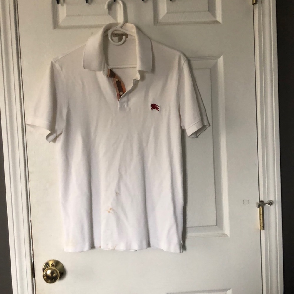 Authentic Burberry polo shirt. Size S. Very good condition.